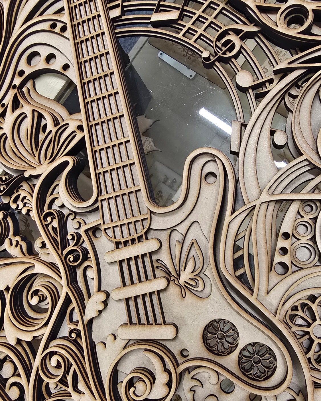 A sneak peak of something new, this is the part way through this epic multi layered guitar design. Open to colour suggestions, what colours would you use?
Product details: 400x500mm approx, 8 layers of 3mm wood, will be a substantial piece when finished.